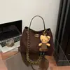 Bolso de Cadena de Moda y Sencillo para Mujer Otoño e Invierno 2025 Nuevo Bolso Cruzado de Hombro Casual Bolso Cubo de Moda para el Trabajo