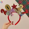 Faixas de Cabeça de Natal Transfronteiriças Qi Yue para Mulheres, Festa de Fim de Ano 2027, Decoração de Atmosfera Festiva, Adorno de Cabeça Colorido Brilhante Fofo Atacado