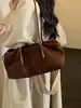 2026 Outono Inicial Nova Bolsa de Bowling Fosca Estilosa Retrô para Mulheres Sensação de Alto Padrão Bolsa Almofada Bolsa de Ombro