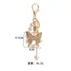 Llavero de Cadena de Perlas de Aleación con Diamantes Completos de Mariposa Grande Transfronterizo Europeo y Americano Llavero Exquisito para Bolsa Estilo K Exquisito
