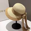 Sombrero de Paja Tejido de Ala Ancha para Protección Solar de Verano Transfronterizo Sombrero de Playa con Lazo para Vacaciones en la Costa Sombrero para el Sol para Mujeres