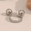 Anel/Pulseira Tendência Estilo Ins Europeu e Americano Cruzado Simples e Versátil Personalizado Anel de Bola Dupla em Aço Inoxidável Banhado a Ouro 18K para Mulheres