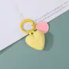 Llavero de color sólido Dopamina con forma de corazón y cara sonriente Accesorio DIY Llavero hecho a mano con cuentas Colgante para bolso
