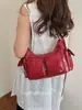 Bolso de axila de nicho coreano para mujer 2024 Nuevo Vintage Simple de alta gama Bolso cruzado Dulce Fresco Bolso de motociclista