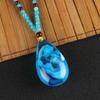 Collar de Cera de Abejas Ámbar Azul Flor Floreciendo Riqueza Gota de Agua Colgante de Flor Collar Largo Colgante Joyería para Parejas Hombres y Mujeres