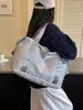Colección de otoño 2026 transfronteriza: bolsa de viaje corta para mujer, bolsa de mano portátil, bolso de hombro, bolsa casual para la playa o piscina, bolsa para deportes y fitness