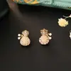 Trae Riqueza y Tesoro Bolsa de Dinero Pendientes de Perlas de Mijo Diseño de Nicho Pendientes Pequeños y Exquisitos de Gama Alta Aguja de Plata S925 Pendientes Elegantes