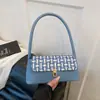 Bolsa de Axila com Design Moderno e Estiloso 2026 Outono Nova Moda Textura Casual Versátil Simples Bolsa de Ombro de Mão