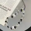 Cadena para Teléfono Versátil Mariposa Blanco y Negro Dulce Fresca Chica Picante Correa para Cámara CCD Correa para Funda de Teléfono Universal con Cuentas