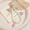 Colgante Llavero de Concha de Perla para Mujer Moda Cadena para Teléfono Accesorios de Bolso Sentido del Diseño Adornos Pequeño Regalo Al Por Mayor