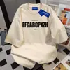 Camiseta Feminina de Manga Curta com Estampa de Letras da Marca Americana Ins Tendência Verão 2025 Casual Solta Moda Versátil Gola Redonda