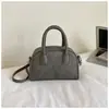 Bolso de Mano Minimalista Boston 2026 Modelo Nuevo Bolso de Bowling de Gama Alta Versátil de Nicho Bolso Cuadrado Pequeño Bolso Cruzado