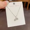 Design de moda de nicho super brilhante pingente de folhas totalmente cravejado de diamantes colar temperamento luxo leve simples corrente de clavícula versátil atacado