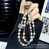 Cadena para Teléfono Móvil de Perla de Cristal Doble Capa Linda Aleación Corazón de Chica Kt Cadena Colgante Versátil Colgante para Funda de Teléfono Móvil Cordón Venta al por Mayor