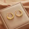 Acero de Titanio Color Libre Metal Pendientes Personalizados Europeos y Americanos Calle Casual Accesorios para la Cabeza Pendientes de Anillo Transfronterizos Puesto