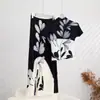 Nuevo Traje Elegante de Dos Piezas para Mujer de Verano, Camiseta Estampada de Gama Alta, Top de Manga Corta, Falda con Caída