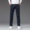 Novas Calças Casuais Elásticas para Homem 2026, Primavera e Verão, Calças Masculinas Slim Retas Off-White, Calças Masculinas Versáteis da Moda