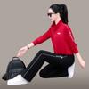 Traje deportivo de moda estilo extranjero 2025 otoño nuevo conjunto de dos piezas de color liso explosiones de moda de internet traje deportivo con cuello alto