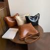 Bolso Bucket Niche para Viajero 2025 Nuevo Bolso Cruzado de Cuero Vintage Encerado al Aceite de Gran Capacidad para Viajero Bolso Tote de Alta Gama