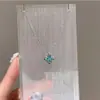 Collar de Flor de Cuatro Hojas Brillante con Diamantes y Circonita Azul de Lujo Ligero para Mujer, Diseño de Nicho de Gama Alta, Cadena de Cuello de Moda, Joyería Exquisita