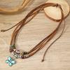 Collar de joyería tejido a mano con nudos de cuentas de madera multicapa, aleación de mariposa artística retro europea y americana