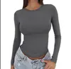 2026 Amazon nueva camiseta básica versátil de manga larga con cuello redondo, corte ajustado, estilo europeo y americano, para primavera y otoño, color liso, corte ajustado para mujer