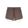 Pantalones cortos de running y fitness para hombre, talla europea, de nailon elástico en cuatro direcciones, corte ajustado, con forro interior, para deportes y actividades al aire libre