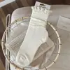 Calcetines para mujer 2026, nueva colección otoño/invierno, con encaje y una paleta de colores cremosa, de longitud media a la pantorrilla y de material de algodón transpirable