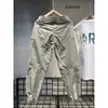 Moda de Verano Estilo Británico Holgado Funcional Diseño Patchwork Pantalones Casuales Verano Secado Rápido Frescos Pantalones Harem para Hombre Modernos