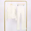 Conjunto Lulu Df de Jaqueta com Capuz Estampada e Calça Flare, Gola Alta Justa, Zíper Dourado Elástico, Roupa para Fitness Yoga