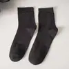 Calcetines de algodón para hombre, calcetines de caña media, otoño e invierno, negocios casual, algodón puro, primavera y otoño, calcetines para hombre, color liso, empaque individual, calcetines de algodón para cuatro estaciones
