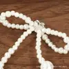 Decoración de lazo de perlas estilo Chanel accesorios hechos a mano con cuentas accesorios para joyería DIY accesorios para funda de teléfono parches 3D