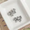 Una Variedad de Colgantes de Lazo de Aleación Dulces y Frescos Joyería Hecha a Mano DIY Collares de Mano Pendientes Colgantes Accesorios Materiales