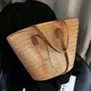 Bolso tejido de paja para mujer de gran capacidad 2022 nueva moda otoño e invierno bolso de hombro tejido clase de textura bolso tote para ir al trabajo