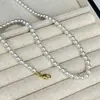 Moda para o Dia a Dia Colares de Pérola em Camadas para Mulheres com Pingentes de Pedras Preciosas, Design de Nicho Levemente Luxuoso com um Toque de Alto Padrão, Acessórios Simples e Versáteis