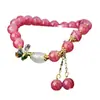 Pulseira Série Guofeng Mais Vendida Internacionalmente Cristal Rosa Diamante Colorido Bolsa da Sorte Fivela Ping An Lótus Rosa Bract Pulseira Artesanal para Mulheres
