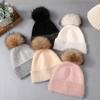 Gorro de piel de mapache auténtica, gorro de punto cálido de piel de conejo para mujer, gorro de lana de invierno a la moda para comercio exterior transfronterizo.