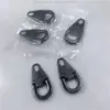 Soporta cabezales de cremallera FASHION de aleación personalizada, tiradores desmontables y etiquetas móviles de alta resistencia para bolsos, zapatos y botas