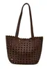 Bolso cubo de un solo hombro calado estilo coreano para mujer, nuevo modelo de verano 2026, bolso tote tejido dos en uno para vacaciones y viajes