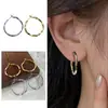 Brincos de Argola Grandes Torcidos Simples e Versáteis de Novo Estilo para Mulheres, Ear Cuffs Modernos e Únicos com um Toque de Nicho de Alto Padrão