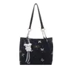 A bolsa tote nicho popular deste ano para mulheres, novo estilo Primavera 2026, estilosa, para o trabalho, bolsa de ombro único, versátil, bolsa de axila
