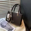 Comercio Exterior Transfronterizo Moda Lujo Ligero Viaje Bolso Pequeño Mujer Nuevo Bolso de Mano de Nicho de Gama Alta Bolso de Hombro Cruzado Tendencia