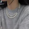 Cadena de cuello doblada de doble capa con hebilla dividida en forma de 8, elegante cadena de suéter de perlas de alta gama, accesorios de cadena de clavícula de nicho de lujo ligero