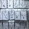 Loja de 2 yuans Conjunto de colar com corrente para clavícula, anel e brincos femininos, terno de combinação, pequeno presente, joias para estudantes