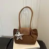 Outono de 2026 Novo Estilo Retrô Bolsa de Mão de Pelúcia Camurça Feminina Versátil para o Dia a Dia Bolsa de Ombro Única Bolsa Tote Atacado Bolsas Femininas