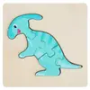 Juguete de rompecabezas de dinosaurio tridimensional con hebilla de madera para niños, rompecabezas creativo de dibujos animados para la educación temprana del bebé