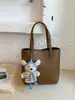 Bolso Cubo Trendy Coreano para Mujer Primavera 2026 Nuevo Bolso Tote de Nicho con un Toque de Lujo para el Trabajo y Uso Cruzado