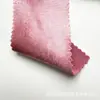 Tejido de satén elástico, grueso y brillante con una caída suave, que presenta un efecto reluciente de seda artificial, adecuado para disfraces de baile y ropa formal.