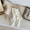 Calcetines de estilo Melard ins con volantes hasta la mitad de la pantorrilla, adelgazantes, estilo JK, de alta gama, sencillos, versátiles y con un look preppy