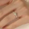 Fuente de Suministro para Transmisiones en Vivo de Tiktok: Anillo de Diamante Estrella de Moissanita Imitación de 1 Quilate para Mujer, Anillo de Boda de Oro Rosa de 18K y Oro Blanco al por Mayor